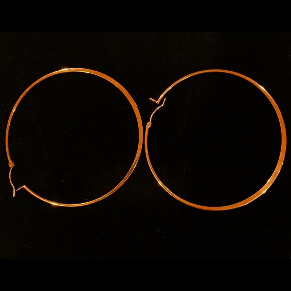 Gold hoop earrings with hinged back